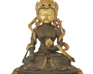 1293
An Asian parcel gilt and silvered bronze Buddha figure
20th century
With impressed seal to baseplate
14" H x 10" W x 7.5" D
Estimate: $600 - $800