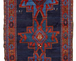 1112
A Karabagh Caucasian rug
Early 20th century
Dated 1935 in the weaving
Wool on wool foundation
8' 5" L x 4' 6" W
Estimate: $700 - $900