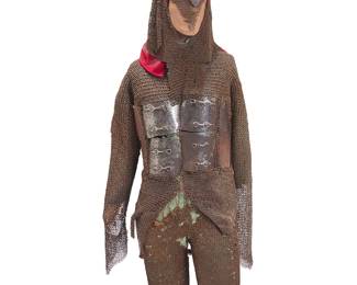 1121
A suit of chain mail and 'Turban' helmet
18th/19th century
Comprising a two-piece suit of chain mail including a long sleeved tunic with metal plates to the front with riveted fasteners, and overlapping plates to the back, with a shaped hem, together with a pair of chain leggings, and a 'Khula Khud'-style spiked helmet with nose guard, two plume holders and a chain mail neck guard or 'aventail' attached to the helmet edge as well as a separate chain mail head covering, all mounted to a mannequin figure
4 pieces
Shirt: 28" H x 24" W (at front chest); Leggings: 35" H approximately; Hood: 20" H x 25.5" C; Helmet: 16" H x 7.25" Dia. (including neck guard)
Estimate: $500 - $700