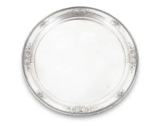 1012
A Lebkuecher & Co. sterling silver charger
1896-1909
Each marked for sterling, with factory marks and numbered: 3701-12 C / B / Hand Chased
With chased and repoussé floral motifs to rim
12" Dia.
23.2 oz. troy approximately
Estimate: $500 - $700