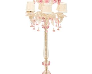 1225
A Murano glass six light floor candelabra
Mid-20th century
Appears unmarked
The gold-impregnated glass with applied floral elements and cloth shades, electrified
53" H x 21.5" Dia.
Estimate: $1,000 - $1,500