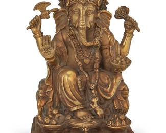1101
An Indian brass figure of Ganesha
19th century or later
With impressed seal to baseplate
6.5" H x 4.25" W x 4" D
Estimate: $350 - $550