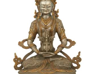 1064
A Tibeto-Chinese parcel gilt and silvered metal figure of Amitayus
18th century or later
With impressed seal to baseplate
11" H x 8.5" W x 5" D
Estimate: $1,500 - $2,000