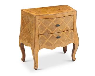 1240
A small Louis XV style parquetry commode
Late 20th century
With shaped front, burlwood veneer, and two drawers with foliate-form pulls
19.5" H x 20.5" W x 11.75" D
Estimate: $400 - $600