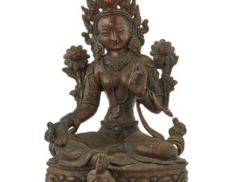1070
A Tibeto-Chinese bronze figure of Tara
19th century or later
Incised dedication verso; with impressed seal to baseplate
With inset coral accents to headpiece
9.125" H x 5.5" W x 4.625" D
Estimate: $450 - $650