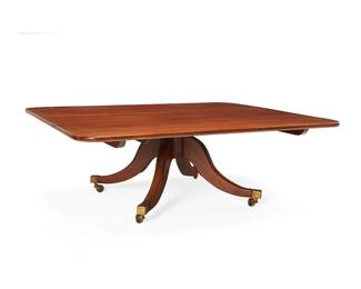 1339
An English mahogany coffee table
20th century
The tabletop mounted on a pedestal with four sloping legs terminating in brass sabots and casters
19" H x 55.25" W x 45.75" D
Estimate: $100 - $200