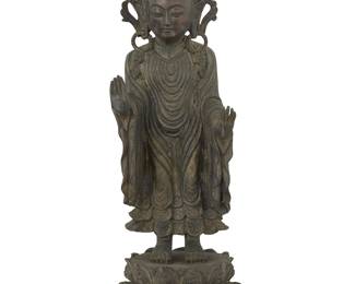 1089
A South Asian Udayana style cast metal standing Buddha figure
20th century
With impressed seal to baseplate
11" H x 4" Dia.
Estimate: $400 - $600