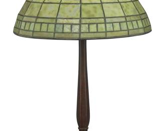 1261
A Tiffany Studios leaded glass table lamp
Early 20th century
Base impressed: TIFFANY STUDIOS / NEW YORK / 534; shade impressed TIFFANY STUDIOS / NEW YORK / 1901
The dichroic glass domed shade raised on a patinated bronze base issuing two lights, electrified
Base: 22.25" H x 7.75" Dia.; Shade: 6.625" H x 16.625" Dia.
Estimate: $4,000 - $6,000