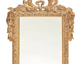 1244
A Louis XVI style giltwood mirror
20th century
Crested with a laurel wreath, with foliate pendants and trim
32.25" H x 24.5" W x 2.875" D
Estimate: $400 - $600
