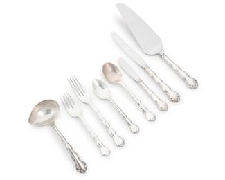 1015
A Reed & Barton sterling silver 'Tara' flatware service
Produced 1955-2011
Each marked for sterling and with factory marks
Comprising:
12 dinner knives (9.125")
12 dinner forks (7.5")
12 salad forks (6.5")
12 oval soup spoons (6.75")
12 teaspoons (6")
1 gravy ladle (6.75")
1 butter spreader (6.5")
1 cake/pie server (10.625")
63 pieces
Weighable sterling: 69.6 oz. troy approximately

Together with:
16 associated sterling silver spoons
14 silver-plated serving utensils
93 pieces total
Total weighable sterling: 87.9 oz. troy approximately
Estimate: $1,800 - $2,200