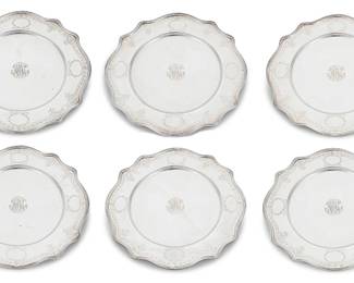 1013
A set of six Marcus & Co. sterling silver plates
Early 20th century
Each marked for sterling, with factory marks and numbered: Marcus & Co. / Sterling / 3536/49
With chased laurel wreaths and floral motifs, monogrammed
6 pieces
Each: 11.125" Dia.
Total weight: 114.8 oz. troy approximately
Estimate: $3,000 - $5,000