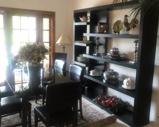 Modern Dark Wood Wall Unit / Designer Shelving System
Description:
Striking modern wall unit featuring a rich dark wood finish and clean architectural lines. This large-scale shelving system makes a stunning statement in a dining room, living space, or open-plan interior. Ideal for displaying décor, books, serving pieces, or styling as a bar wall. Excellent condition, solid construction, and timeless contemporary design. A true designer piece with strong visual impact.
$700