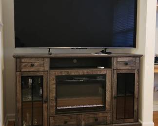 65" smart tv and electric fireplace!