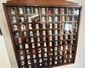 OK, 100 ceramic thimbles from all over 
in a case
