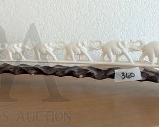 CARVED ELEPHANTS ON STAND