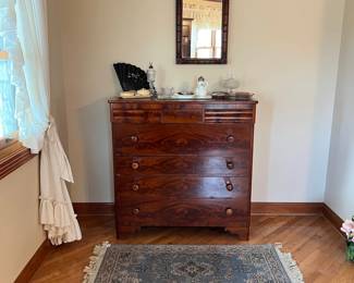 antique American Empire flame mahogany chest of drawers