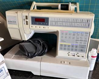 Singer, sewing machine works great