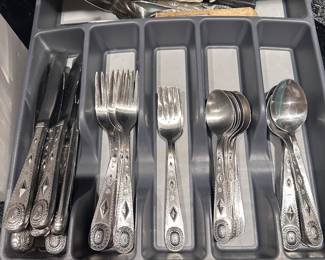 Two sets of silverware