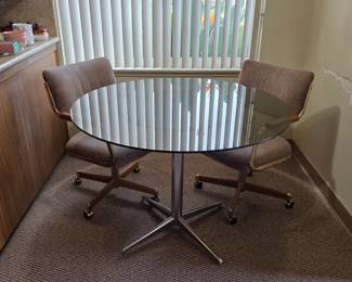 Mid century modern smoked glass top table, vintage Chromcraft chairs