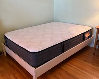 Full size mattress on platform bed frame