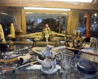 Tobacciana, sterling over-lay jigger, antique sewing accessories, tortoise and mother of pearl brush,  Augarten Wien figurine of Putto mit Zicklein, pair of silver pheasants. 