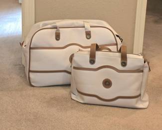 Unused (New) Delsey Paris Chatelet Air Weekender travel duffel bags in what and tan vegan-leather trim