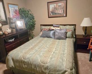 Bed includes headboard, bedframe mattress, and box spring. 