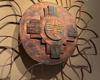 This is a large hand-forged metal wall sculpture, and it’s a statement piece.