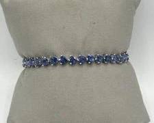 Sterling Silver Tennis Bracelet Featuring 34 Triangular Tanzanite Zoisite Gemstones | Total Weight 9.4 grams