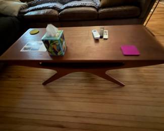 mid-century modern teak "Smile" coffee table designed by Johannes Andersen for CFC Silkeborg Valued at $5,000.