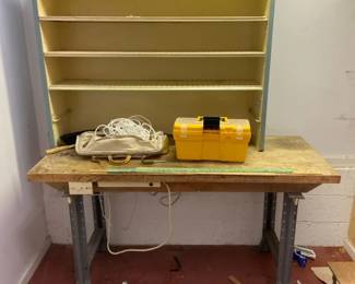 Workbench With Metal Shelf And Some Tools