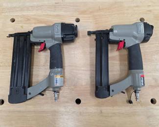 27 2PorterCable18gaugeAirBradNailersInHardCases