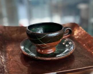 Mexican pottery teacup and saucer, copper serving plate
