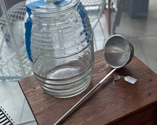 Traditional Mexican vitrolero with serving spoon