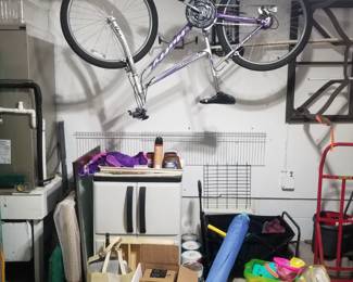 Bicycle; storage cabinet; hand truck; garage goodies