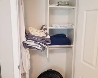 Robes; bed linens; floor fan