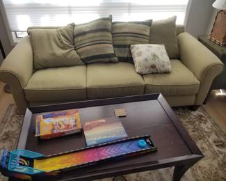 Celery green couch by Town & Country; coffee table 