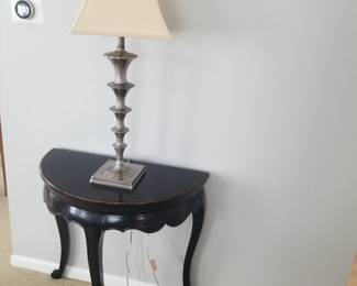 Demilune table; table lamp