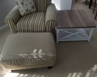 Cozy arm chair; coffee table