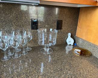 Everyday wine glasses, trifle dish, vintage non-functional Shmoo clock, vintage candy dish