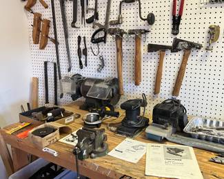 Vintage tools, clamps and hammers in the bins below 