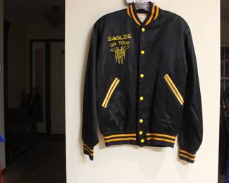 THE FRONT OF ONE OF TWO ORIGINAL1976 ONE EAGLES HOTEL CALIFORNIA TOUR JACKETS.&nbsp; THESE ARE TRUE VINTAGE JACKETS, NOT A MORDERN REPRODUCTION.  THIS JACKET IS IN EXCELLENT CONDITION, NO SNAGS, TEARS, AND NO WORN SPOTS.  THE LINNING LOOKS AS THOUGH IT HASN'T BEEN WORN.  WAS OBTAINED ABOUT 18 YEARS AGO FROM A ROADIE THAT TRAVELED WITH THE EAGLES