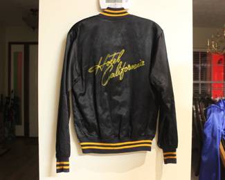 THE BACK OF ONE OF TWO ORIGINAL1976  EAGLES HOTEL CALIFORNIA TOUR JACKETS.&nbsp; THESE ARE TRUE VINTAGE JACKETS, NOT A MORDERN REPRODUCTION..
