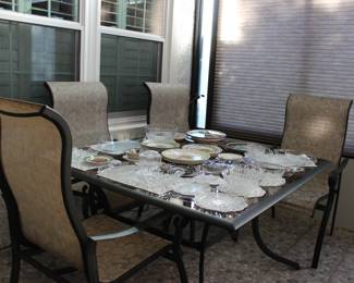 PATIO TABLE AND FOUR CHAIRS