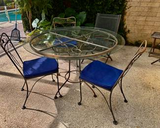 Wrought air on Glass top Table and Chairs