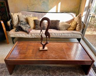 Wooden Table
Futon Sofa
Carved Art