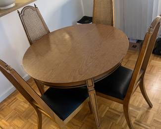 Inquire about this petite 1970’s dining table & chairs. Table has leaves. Perfect apartment size