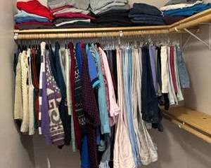 Lot 344  Mixed Lot of Casual Clothing Featuring Sweaters, Shirts, and Pants