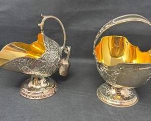 Lot 115  1960s Pair of Silver Plate Handled Basket Candy Bowls by Townsend