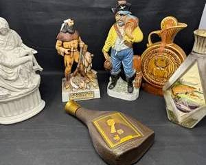Lot 34  Vintage Figural Liquor Decanters  Pirate, Hunter, Religious Figure  Decorative Whiskey Bottles
